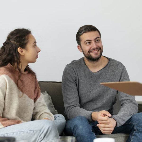 close-up-couple-talking-therapist